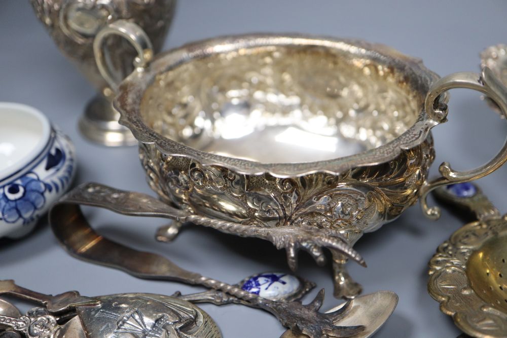 A silver sugar bowl and cream jug, a pair of nut dishes and sundry small silver